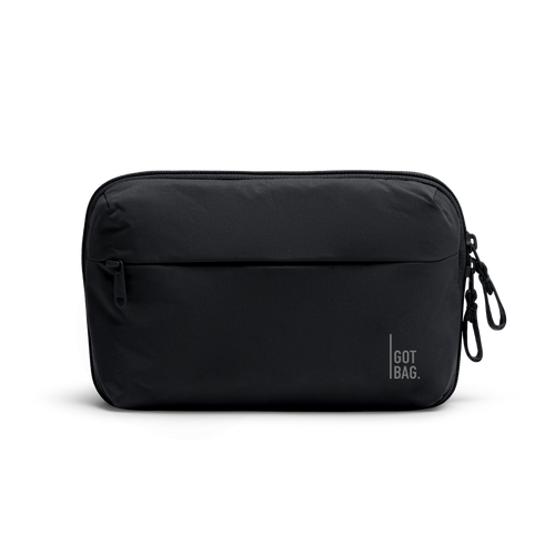 COMMUTERTECHPOUCH Accessoire in black (Schwarz) als Studioaufnahme in Frontansicht.